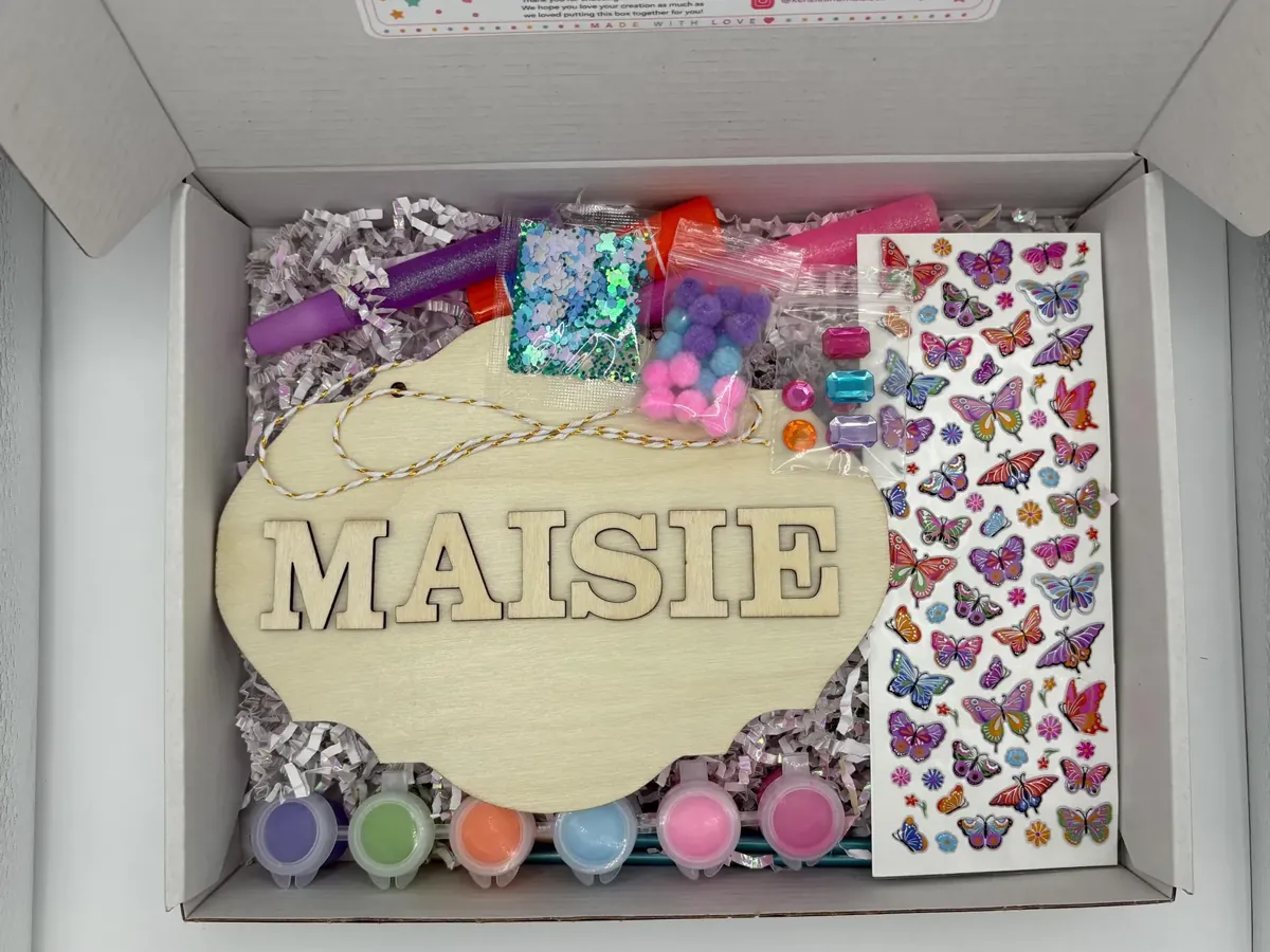 Personalized Name Sign Craft Kit for Kids kit example with unfinished wood pieces and craft supplies